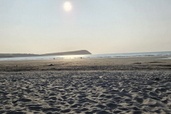 Dinas Head from the beach